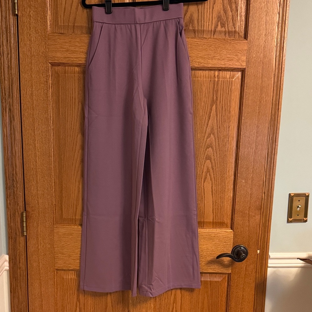 OGL Women's Wide Leg Pants in light purple.